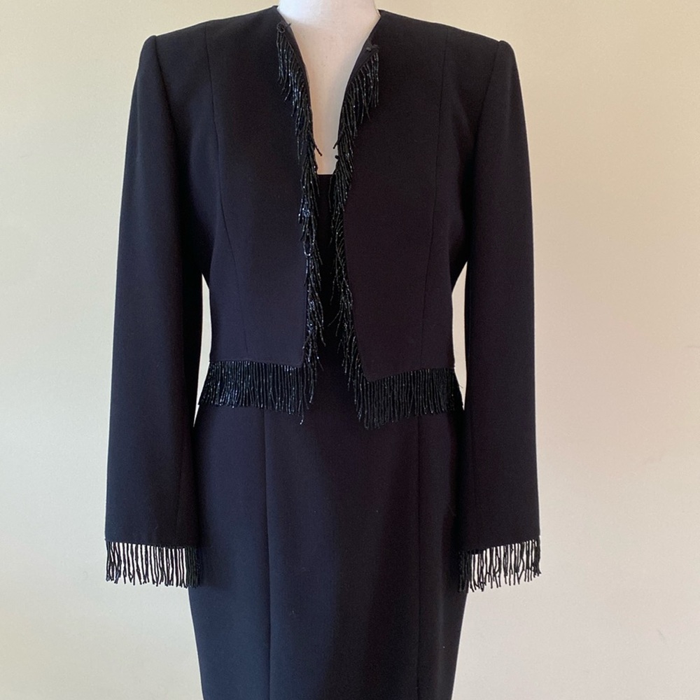 Sexy Black Dress Sz4 2p. with beaded fringe on the sleeves and around the waist.